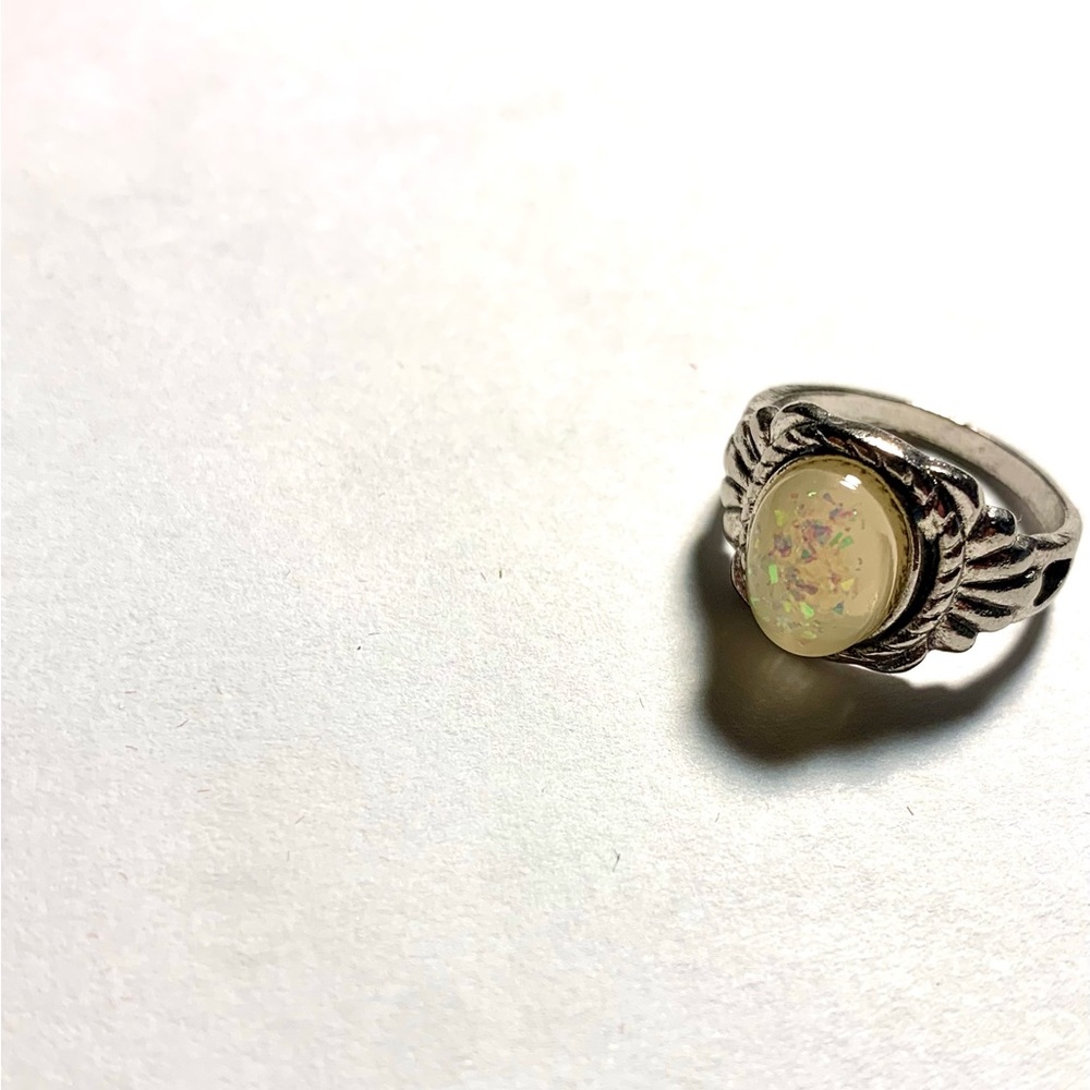 Ethereal Glow: Opal Pinky Ring with 
   a Silver Rustic Look
